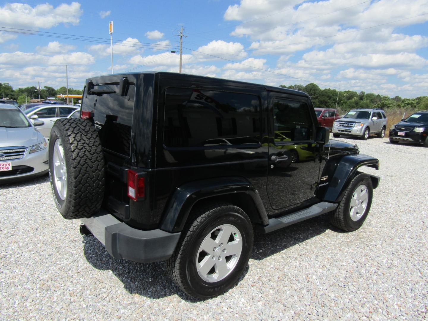 2012 Black /Tan Jeep Wrangler Sahara 4WD (1C4GJWBG2CL) with an 3.6L V6 DOHC 24V FFV engine, Automatic transmission, located at 15016 S Hwy 231, Midland City, AL, 36350, (334) 983-3001, 31.306210, -85.495277 - Photo#6